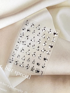 Exquisite 3D embossed heart and star nail art stickers on elegant silk background