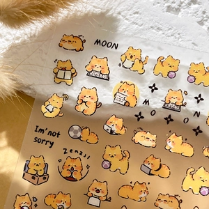 Cute embossed orange cat nail art stickers featuring cartoon kittens for DIY manicure