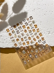 Cute embossed puppy nail stickers with cartoon dogs and motivational text on model YT6208