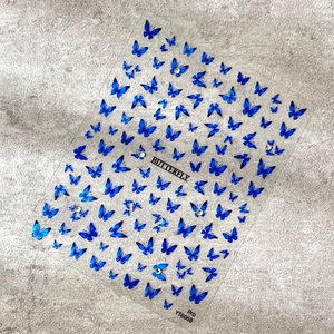 Deep blue laser butterfly nail art stickers with black details and various sizes