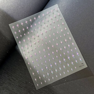Pink and purple gradient starburst nail art stickers with laser finish on dark background