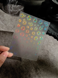 Detailed holographic laser fireworks nail art sticker with sparkling adhesive effect