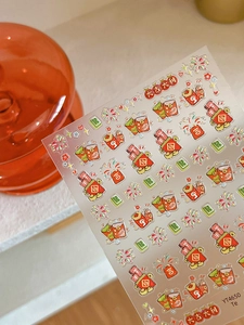 Macro shot of YT4650 New Year nail stickers with fireworks and red envelope patterns
