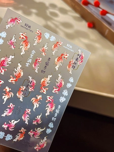 Macro detail of 3D embossed koi fish nail stickers with lucky gold chinese characters