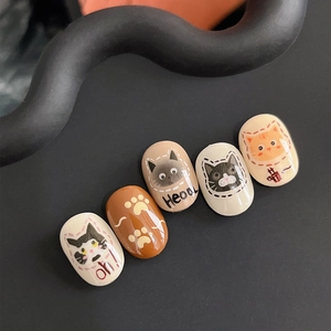 Cute cartoon cat nail stickers set featuring diverse feline designs and paw prints