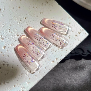 Pink gradient cat-eye press-on nails with laser holographic fireworks design