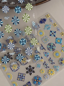 Macro shot of YT4435 embossed bohemian nail art stickers with vintage geometric patterns