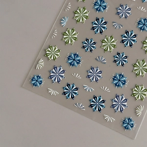 Bohemian 5D embossed nail stickers with blue floral patterns on transparent backing