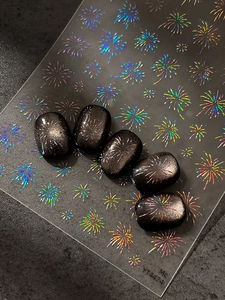 Macro detail of YT4474 laser fireworks holographic nail stickers on black cat-eye base