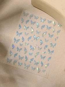 Macro shot of 3D iridescent butterfly nail stickers with metallic laser effect, model YT4558