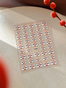 Detailed 3D embossed lion dance nail art stickers in vibrant red and gold patterns