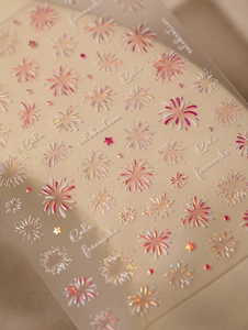 Macro shot of 5D embossed fireworks nail art stickers with laser holographic effects