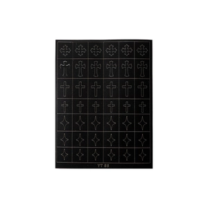 Gothic style nail art stickers with gold cross and star patterns on black base