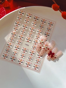 Detail of 3D embossed lion dance nail art stickers with traditional Chinese New Year theme