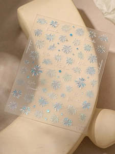 Detailed holographic fireworks and celebration lettering on adhesive nail stickers
