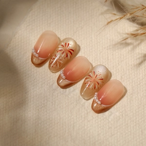 Glittery fireworks nail art stickers with peach gradient and cat eye pearl effects