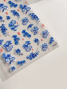 Detailed blue orchid and porcelain snake nail art stickers with silver foil finish
