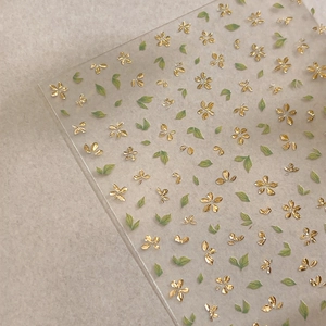 Self-adhesive 3D embossed nail art stickers with gold flowers and green leaves pattern