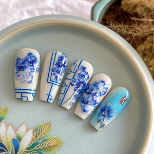 Blue and white porcelain floral nail stickers with silver foil accents and stamps