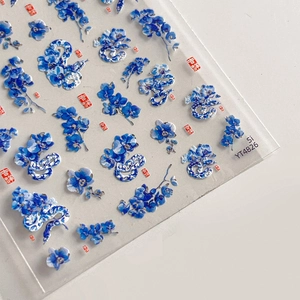Blue porcelain style nail art stickers with orchids, snake patterns and silver accents