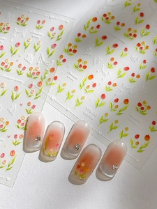 Détail de stickers nail art tulipes gaufrés avec motifs floraux 3D et support adhésif