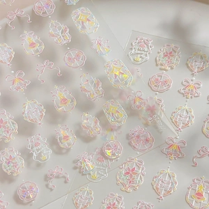 Pink bow and star holographic nail stickers with pearlescent shell finish effect