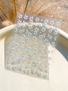 Detail of YT4929 embossed white five-petal flower nail stickers with floral motifs