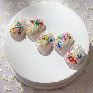 Daisy nail stickers with 3D embossed dried flowers, pearls, and rhinestones