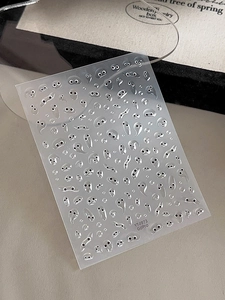 Macro shot of 3D clear jelly eye-shaped nail art stickers on YT4973 sheet