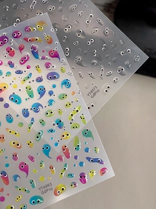 Close-up of colorful cartoon 3D nail art stickers with funny eye designs YT4973