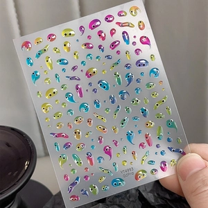 Colorful cartoon slime nail stickers with eye patterns and 3D jelly water drop shapes