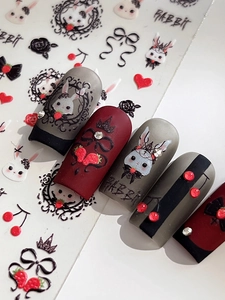 Detail von 3D-Präge-Nagelstickern mit Gothic-Hasen und dunklen Kirschmotiven