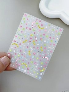 Detailed view of YT5123 floral nail stickers with colorful spring flowers and text