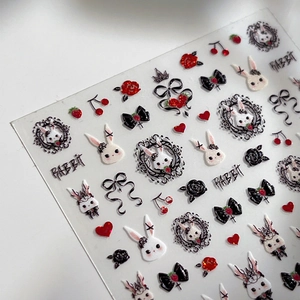 3D geprägte Nageltattoos mit Hasen-, Schmetterlings- und Rosenmotiven in Rot und Schwarz