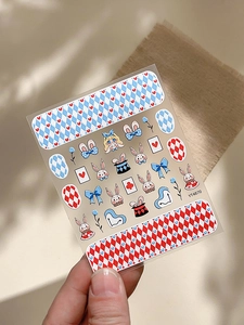 Close-up of cute cartoon rabbit nail art stickers with bows and poker patterns YT4870