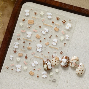 Detailed view of cute cartoon puppy and flower nail stickers with finished manicure examples