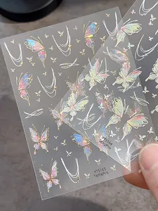 Detailed 3D holographic butterfly nail art stickers with metallic silver ribbon designs