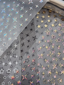 Détails d'autocollants pour ongles étoiles dorés, argentés et holographiques variés