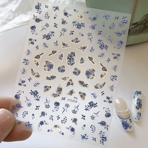 Blue porcelain style nail stickers with gold outlines and floral patterns model YT5058