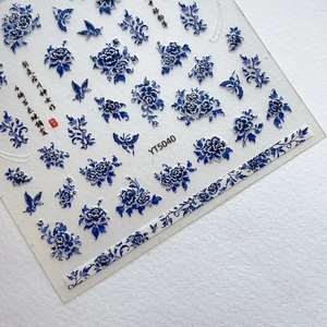 Blue and white porcelain style embossed nail stickers with floral and butterfly patterns