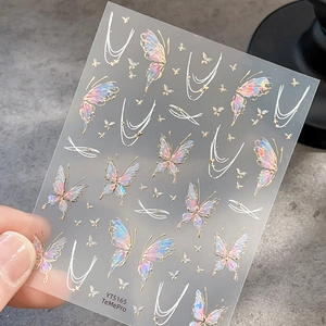 Iridescent butterfly nail stickers with gold foil outlines and holographic star accents