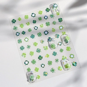 Autocollants ongles trèfle lumineux avec motifs de trèfle vert et effet nacre brillant