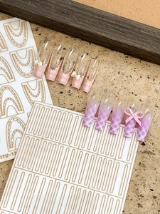 Pink and purple checkered long coffin nails with 3D bows and gold sticker set