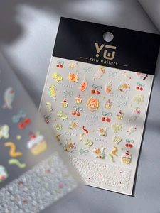 Macro detail of YT5001 5D relief laser nail stickers with cute cats and cherry patterns
