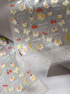 Detailed close-up of 5D embossed cat nail stickers with cute 3D relief texture and patterns