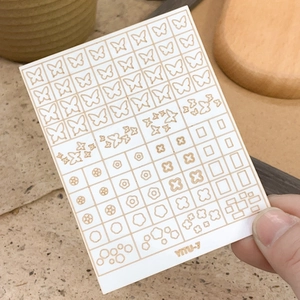 Golden butterfly and floral nail art stickers with geometric star patterns on sheet YITU-7
