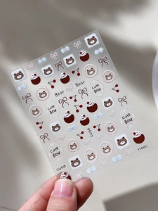 Détails de stickers nail art en relief avec ours mignons, cerises et nœuds sur film
