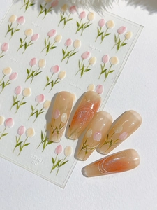 Vue détaillée de stickers pour ongles tulipes et ongles à presser dégradés orange chaud