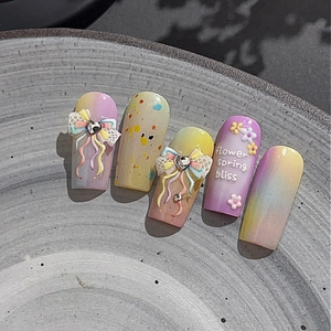 Starry film bow tie nail stickers with pastel gradient, 3D flowers and rhinestones