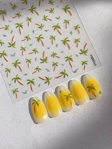 Detail of laser tropical palm tree nail stickers with bird patterns and yellow gradient nails